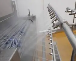 Cleaning around conveyor belts